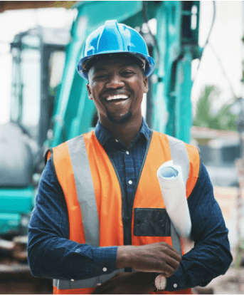 Immigrant building contractor smiling proudly